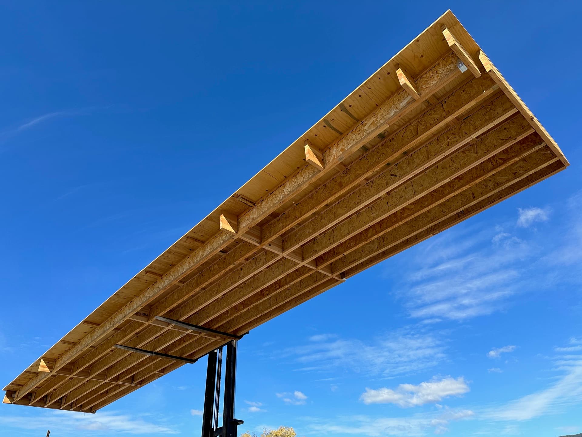Floor cassette from dramatic low angle against blue sky
